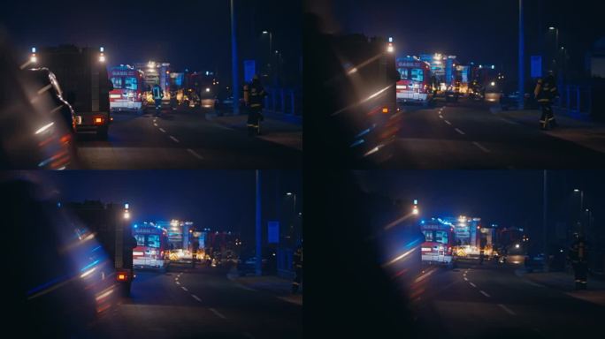 夜间道路事故现场紧急服务人员和车辆