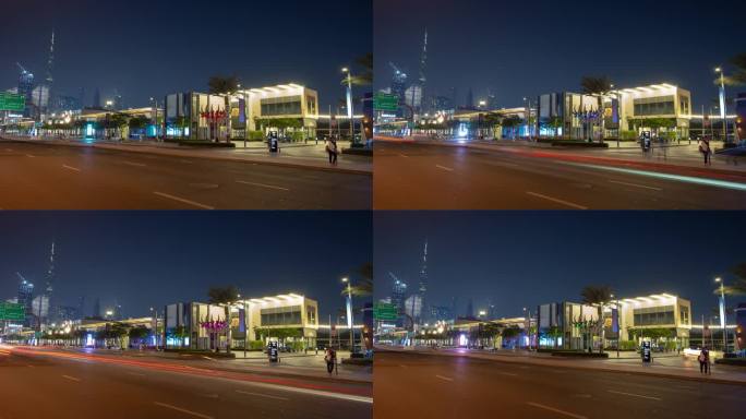 夜间照明迪拜市中心公交车站交通街道全景4k延时阿联酋