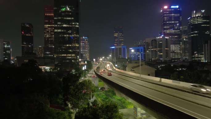 夜间照明雅加达市中心交通街道道路立交桥航拍全景4k印尼