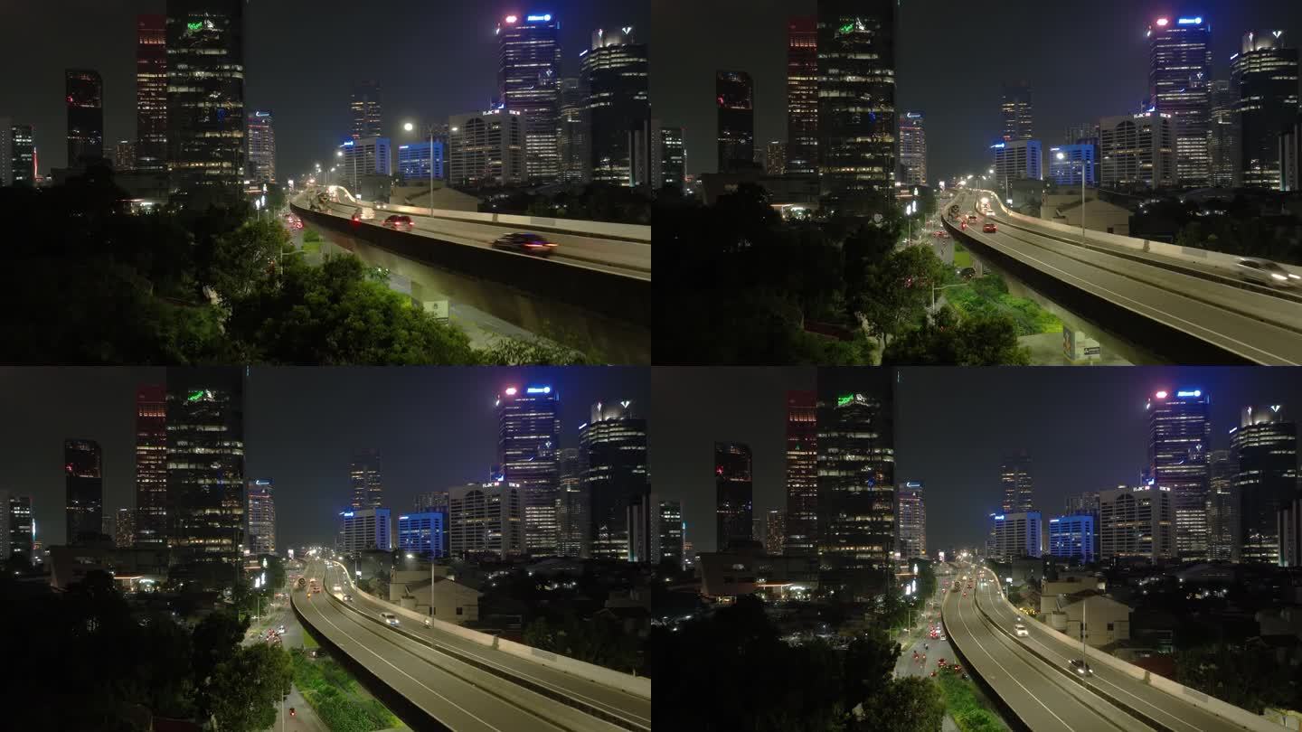 夜间照明雅加达市中心交通街道道路立交桥航拍全景4k印尼