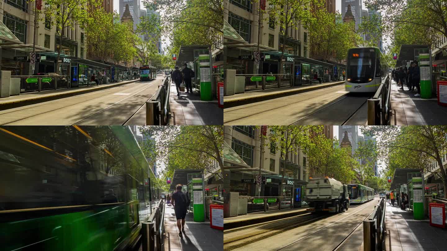 澳大利亚墨尔本，拥挤的通勤者和游客通过轻轨公共交通在墨尔本市政厅站步行和穿过乔治街的4K镜头