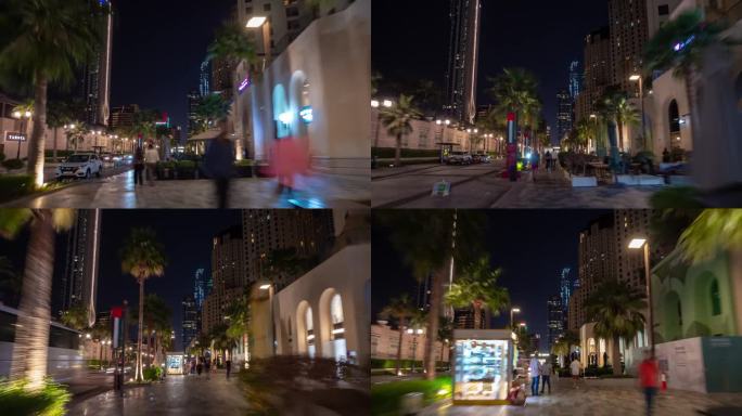 夜间照明迪拜码头著名的拥挤的海湾交通街道步行全景4k延时阿联酋