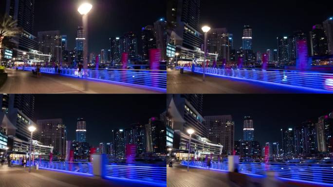 夜间照明迪拜码头著名的旅游海湾步行全景4k延时阿联酋