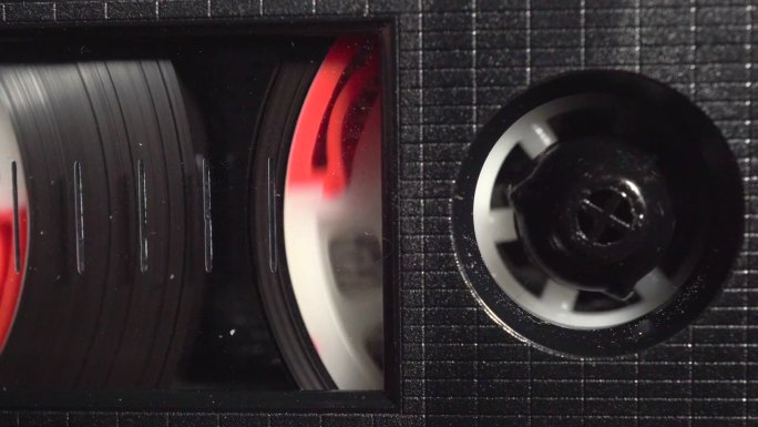 播放旧的盒式磁带磁带转动特写视频素材