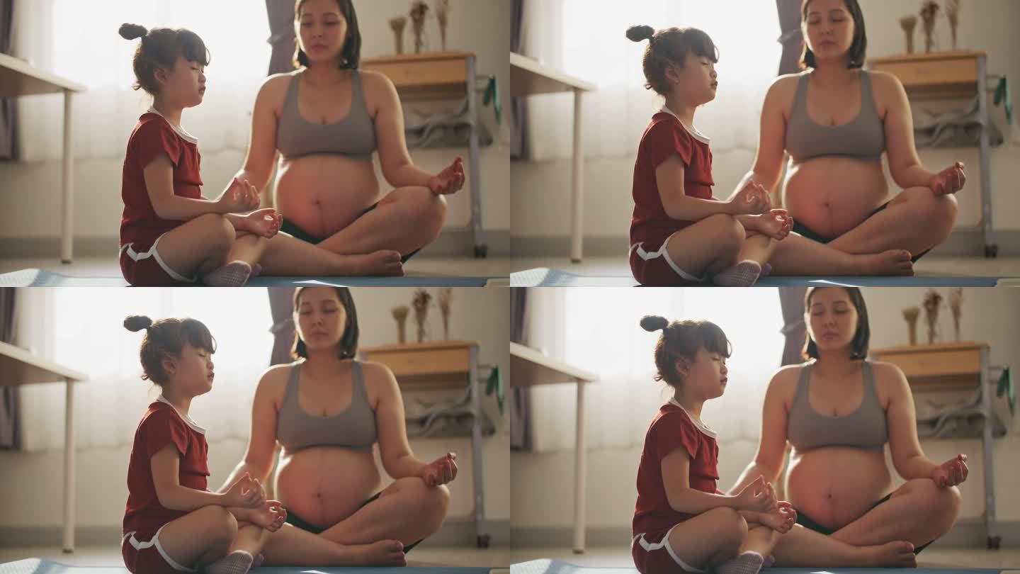 母女俩在练习冥想教育