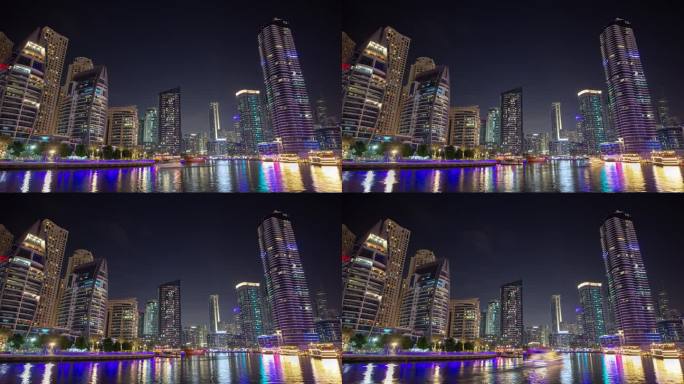 夜间照明著名的迪拜码头反射桥全景4k延时阿联酋