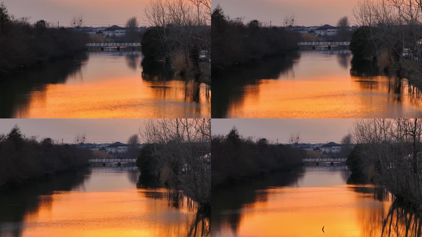 航拍乡村振兴龙型丁达尔光效河流鸟群夕阳