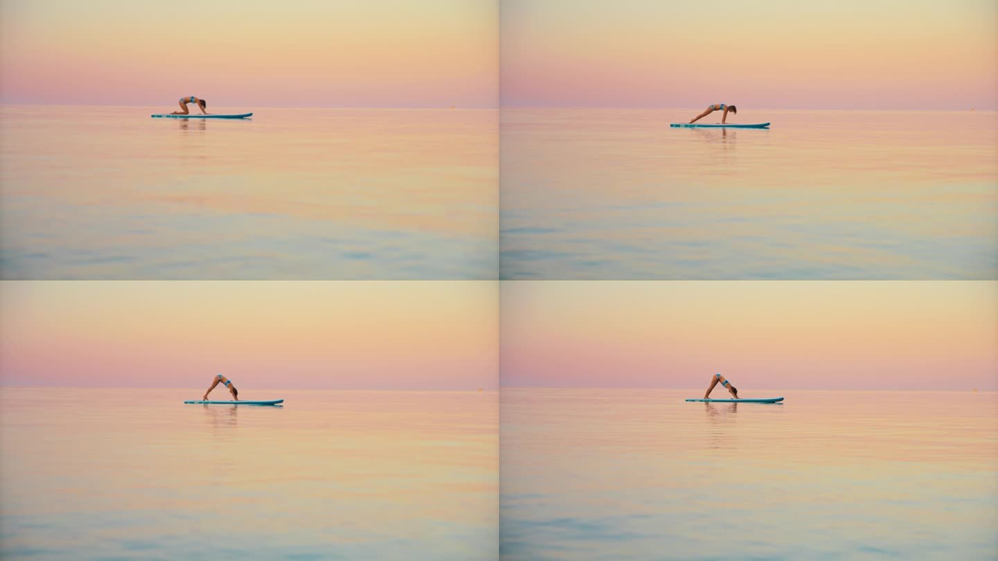 日落时分，健美女子在海上练习瑜伽和冲浪板上的平衡