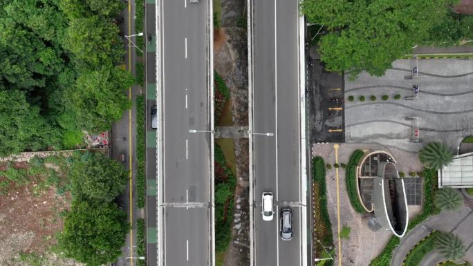 白天雅加达市中心公园交通街道道路立交桥空中俯瞰全景4k印尼