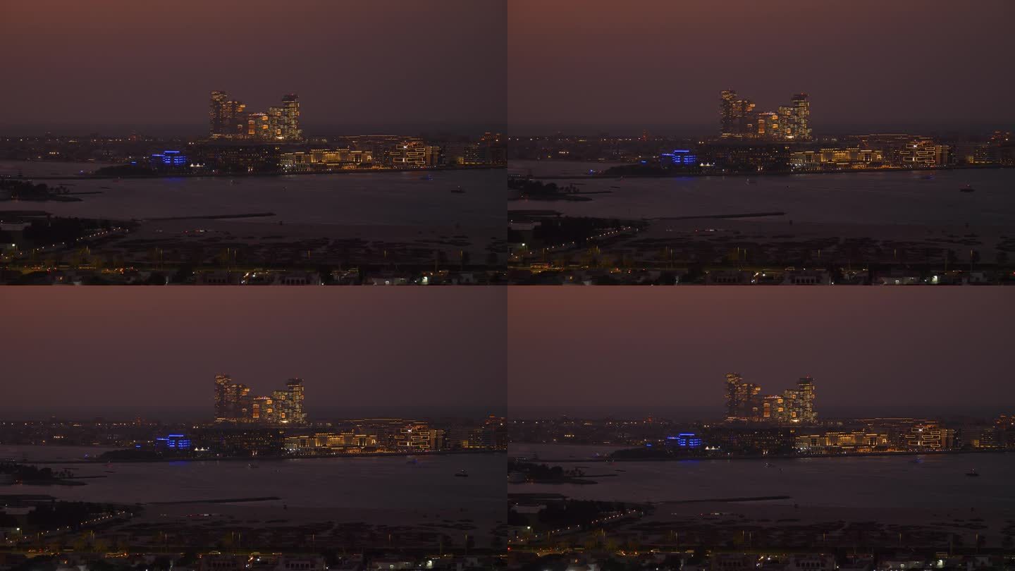 日落天空夜晚照明迪拜市著名的豪华酒店棕榈岛屋顶全景4k阿联酋