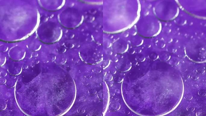 垂直抽象背景闪闪发光的泡泡紫色