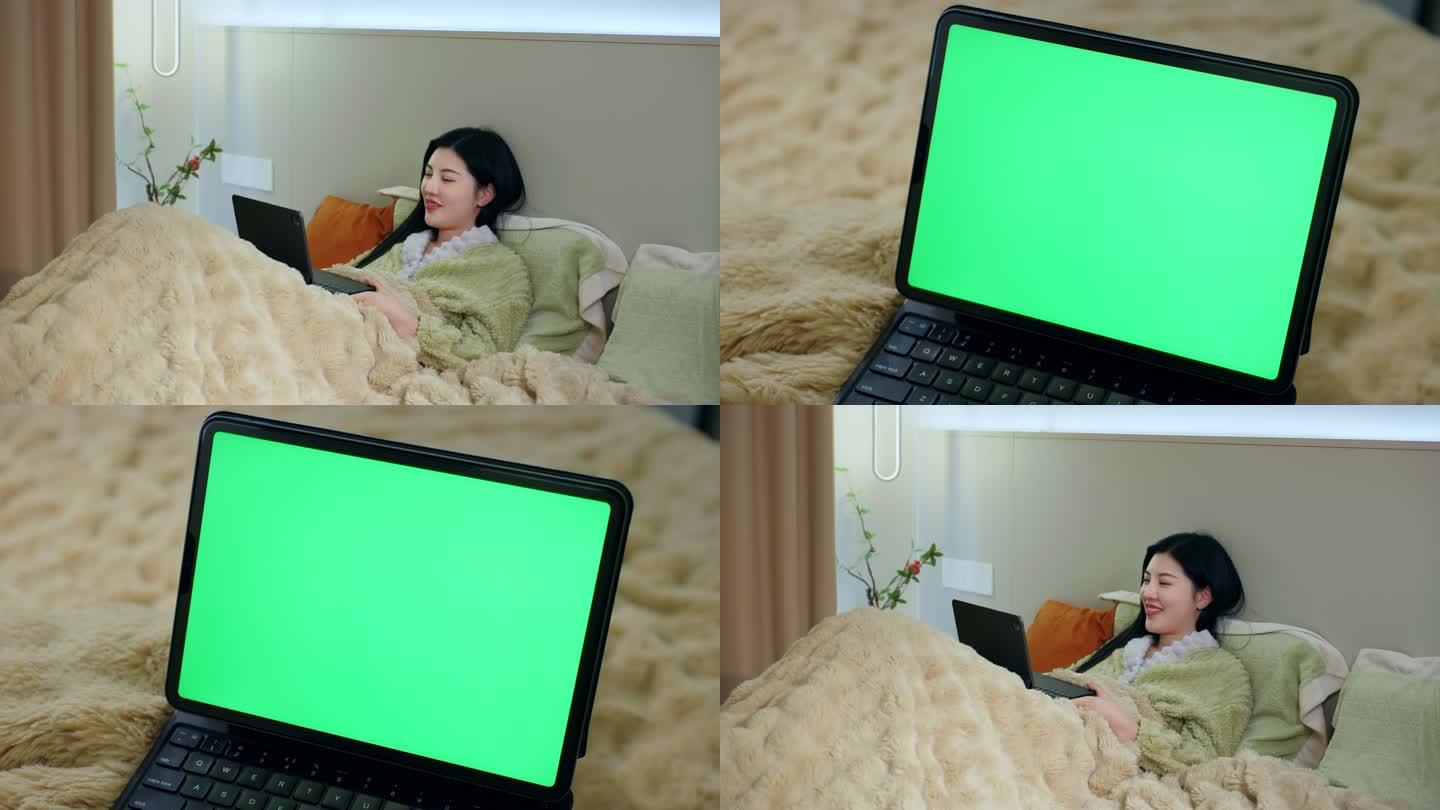 长发美女在床上开心的用平板电脑看剧