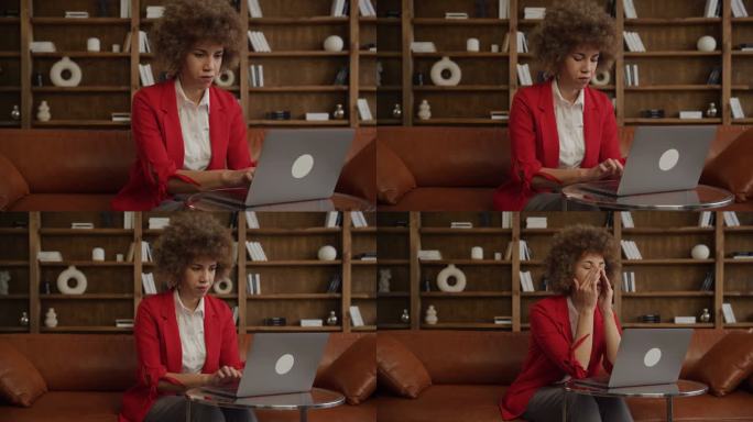 女人在办公室使用笔记本电脑
