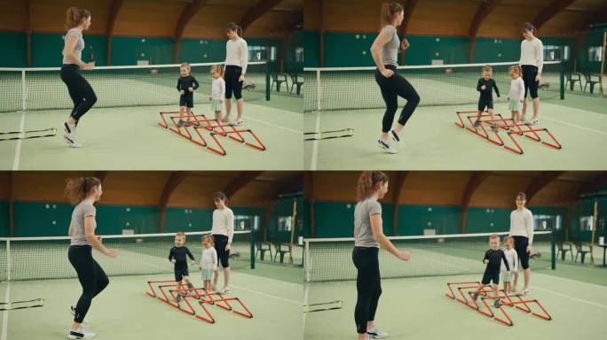少帅女教练在体育会网球场训练小朋友迷你速度栏
