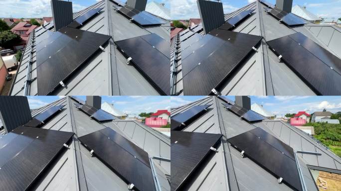 屋顶上有太阳能板的房子，通过光伏效应发电。