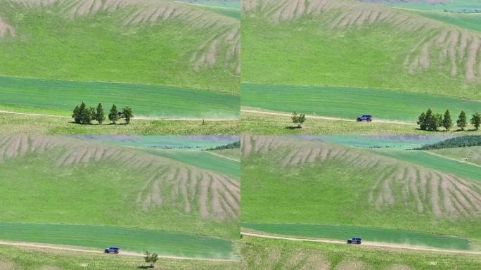 越野车行驶在草原的山脊上