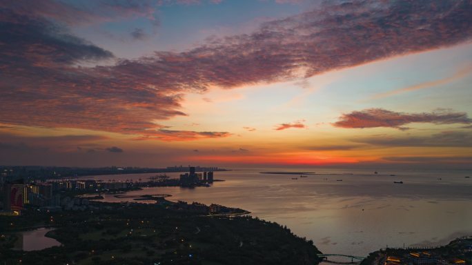 海口湾晚霞日转夜