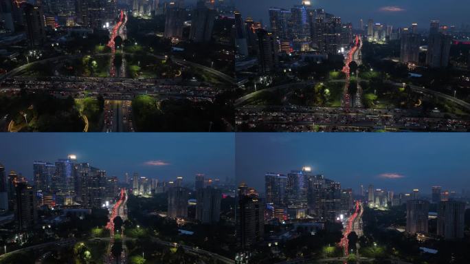 夜间照明雅加达市中心著名的交通街道道路立交空中俯视全景4k印度尼西亚