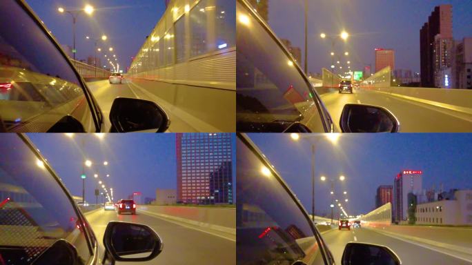 城市夜晚汽车在马路上行驶夜景视频素材2分