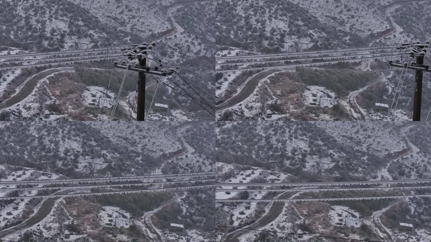 山区农村电力电线输电网冬天积雪结冰冻雨