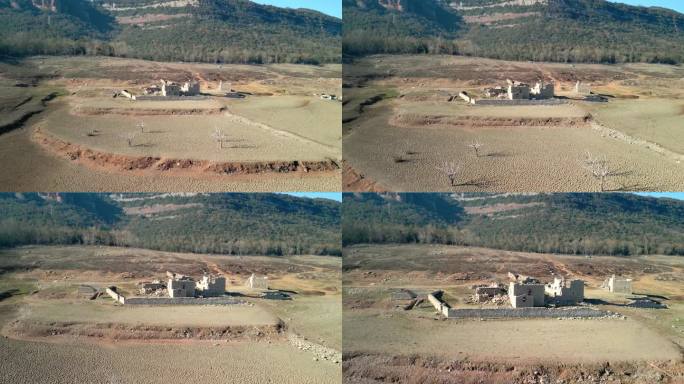 通常被淹没的村庄的景色;现在，由于干旱，废墟可以参观绍沼泽堤防在西班牙加泰罗尼亚，强烈的干旱在202