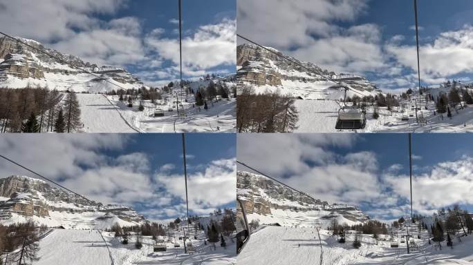 在一个美好的阳光明媚的日子里，滑雪者的缆车正在移动到滑雪道的顶部