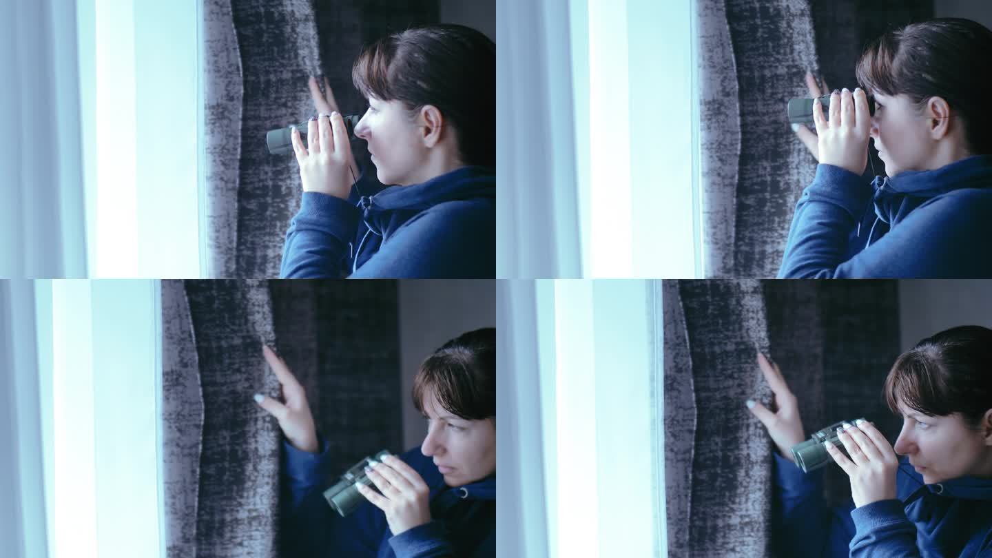 秘密监视:一个女人用望远镜从窗帘后面窥视着她丈夫的情妇