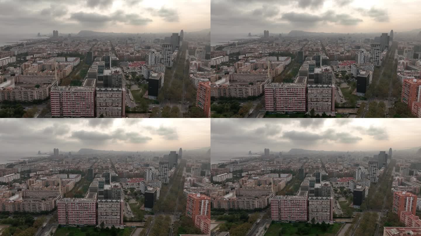 多云的日落巴塞罗那市著名的对角线交通街湾航拍全景4k西班牙