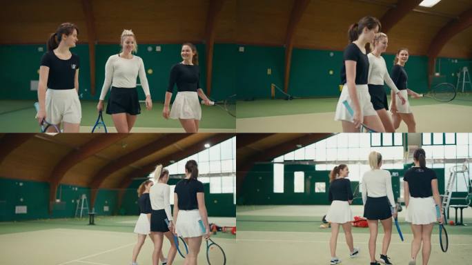 快乐的年轻女网球选手拿着球拍在体育俱乐部场上边走边聊