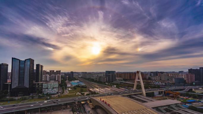 成都火车南站人南立交太阳神鸟桥日落延时