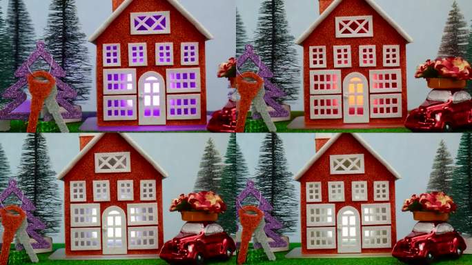 在红房子附近有一棵挂着钥匙的圣诞树和一辆车顶上挂着鲜花的汽车