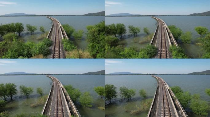 泰国华武里省，铁轨延伸到湖面上。