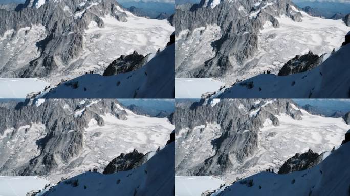 登山者攀登万宝龙雪山