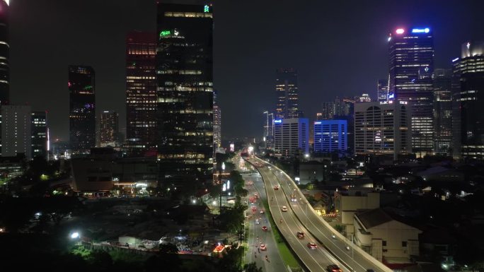 夜间照明雅加达市中心交通街道道路立交桥航拍全景4k印尼