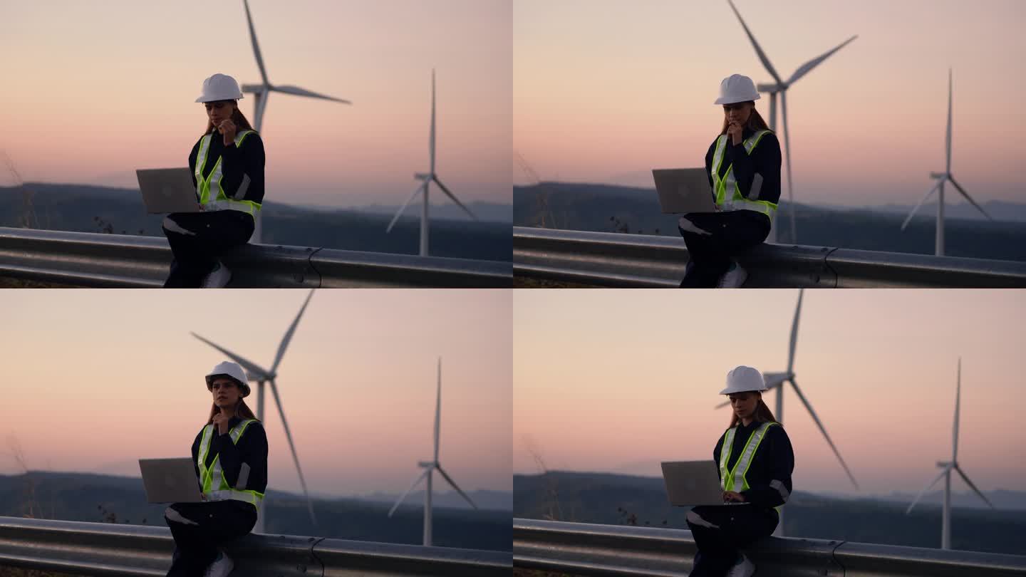 在风车绿色发电机领域工作的女性电力工程师。