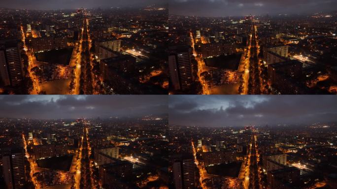 黄昏照明飞行在巴塞罗那市著名的对角线交通街道航拍全景4k西班牙