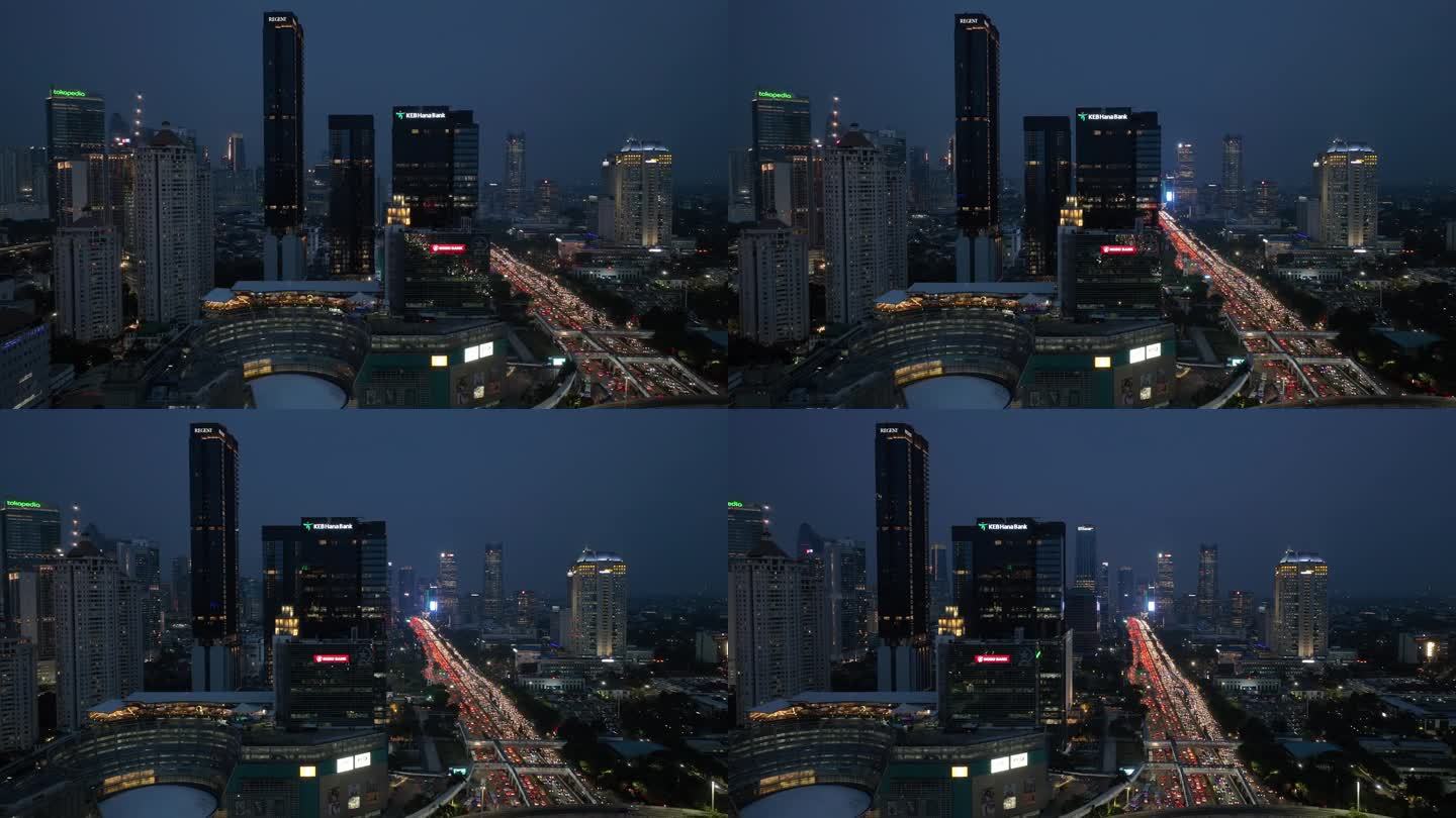 夜间照明雅加达市区交通街道道路航拍全景4k印尼