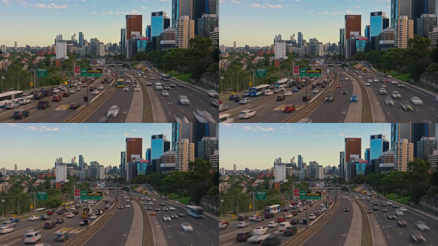 高速公路交通的悉尼城市景观的动态镜头在悉尼，新南威尔士州，澳大利亚晚上的交通和高速公路交通