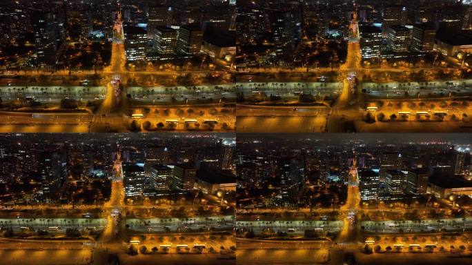 夜间照明巴塞罗那市办公大楼交通街道海湾路航拍全景4k西班牙