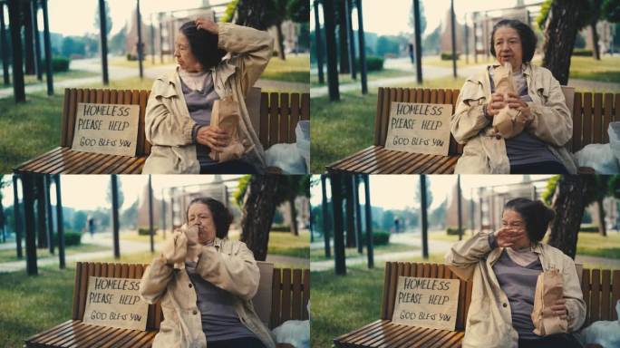 不整洁无家可归的老年妇女喝酒，在公园长椅上乞讨，穷困潦倒