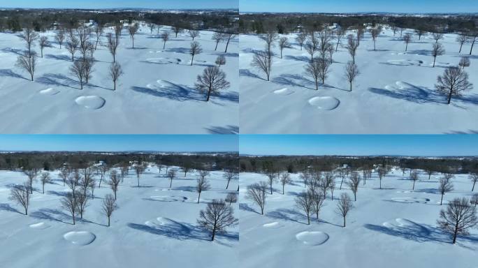 积雪覆盖的高尔夫球场鸟瞰图。晴天的白色风景。