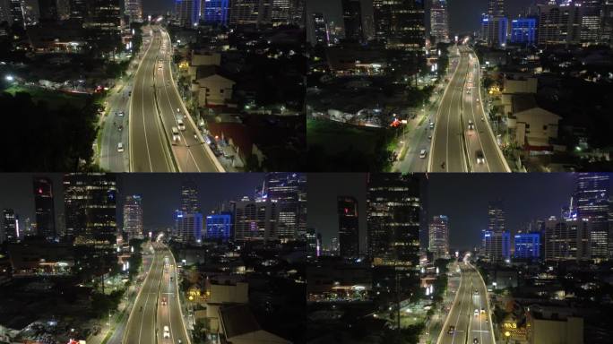 夜间照亮雅加达市中心交通街道道路立交桥航拍全景4k印尼