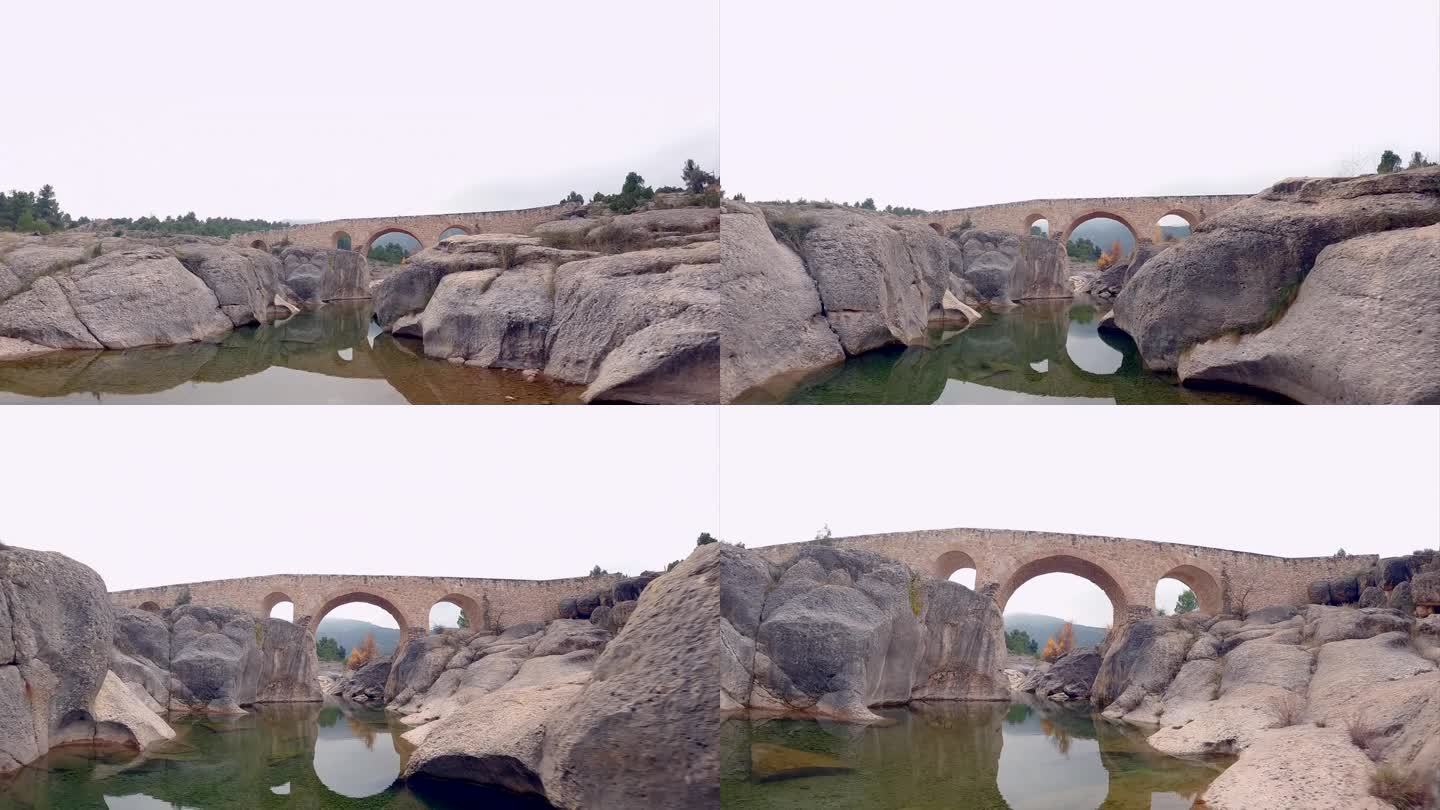 无人机FPV拍摄的西班牙阿拉贡特鲁埃尔阿瓜维瓦附近的贝格尔蒂斯河视频。从卡纳利亚斯桥下经过。