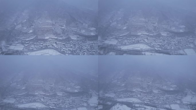 数九寒冬的村庄下雪