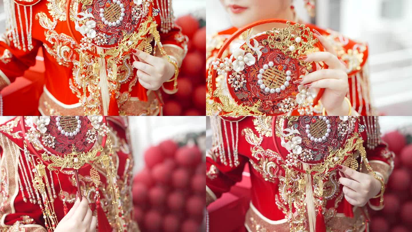 中式新娘手里的中式扇子