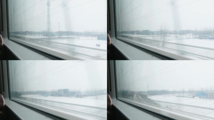 高铁窗外雪景，火车窗外雪景，高铁窗外村庄