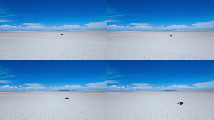 无人机拍摄的玻利维亚乌尤尼盐滩，天空湛蓝，白云飘飘
