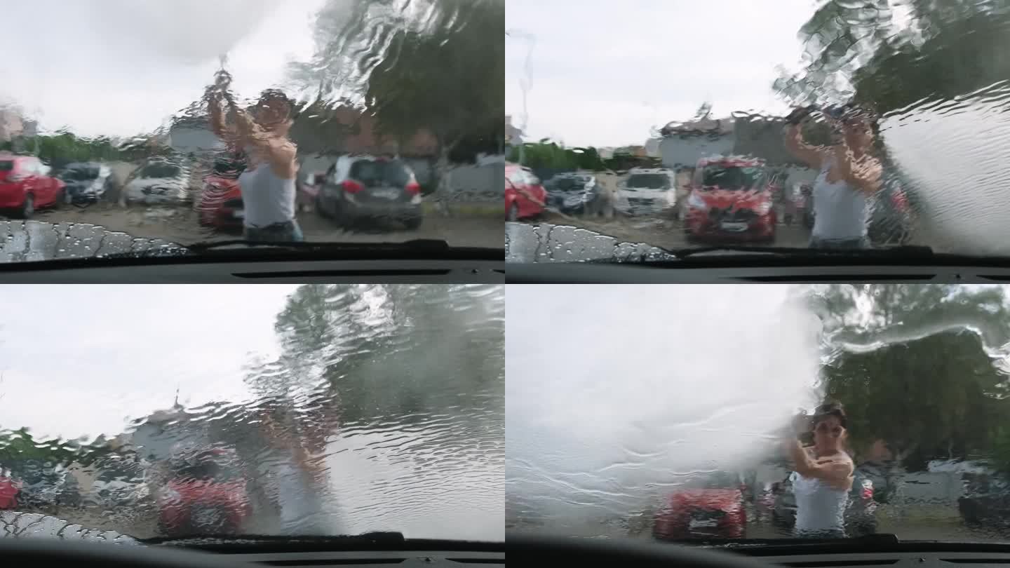 女孩在高压下在非接触式洗车处洗车窗