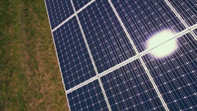 在农场安装和安装太阳能电池板。利用太阳能电池进行充电和储存电力的替代发电厂。