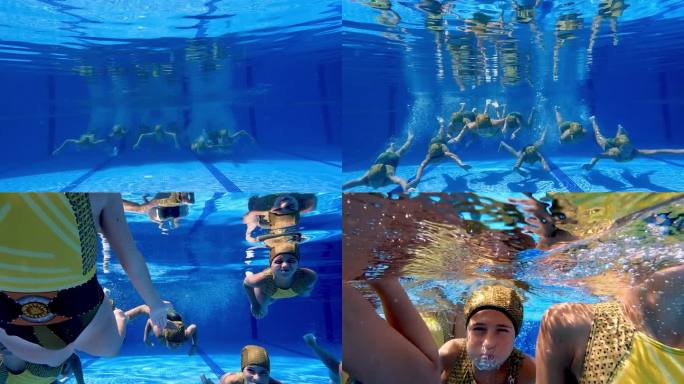 花样游泳课结束后，一队八名少女在奥运会泳池中向前跳水。运动和乐趣的概念。